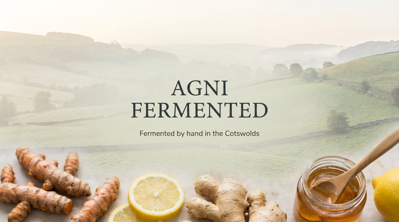Agni Fermented hero banner — Cotswolds hills, fresh turmeric, ginger, lemon and honey